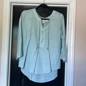 Anthropologie Maeve light blue linen top.